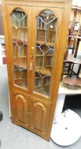 A pine corner cabinet and a white finish bathroom pedestal sink with two taps. (2)