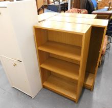 Four beech finish bookcases, and a painted two door cupboard. (5)