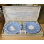 A cased set of Wedgwood state series pin dishes, in the blue Jasperware, 11cm diameter, boxed.