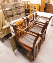 A set of four oak dining chairs, wooden bottle rack, bathroom cabinet, and a brass fire screen. (7)