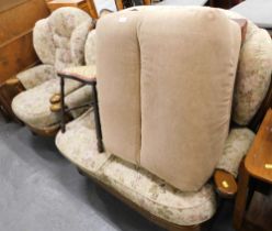 A sofa suite, in the Cottage style, comprising two seater sofa, matching armchair, brown footstool,