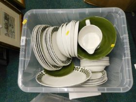 A Johnson brothers part dinner service, on a green ground, comprising meat plates, bowls, side plate