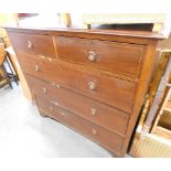 A mahogany chest of two short and three long drawers, with boxwood banding.
