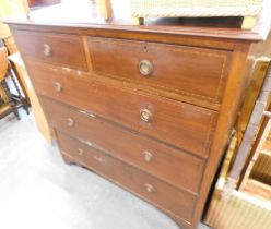 A mahogany chest of two short and three long drawers, with boxwood banding.