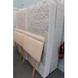 A divan king size bed, comprising two bed bases, mattress and headboards.