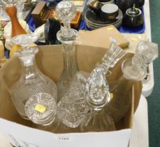 Six cut glass decanters.