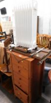 A pine six drawer chest, Art Nouveau style fire screen, two tier side table, heater, and a trouser p