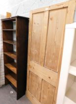 A pine single door, and a mahogany book shelf with studded front.