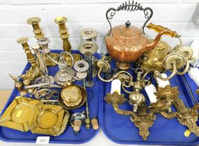 Copper and brasswares, comprising a copper and a brass kettle, copper candlesticks, pin dishes, comp