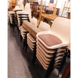 Various stacking chairs and wooden shelving.