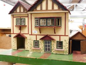 A Tudor style doll's house.