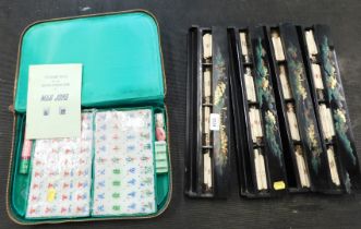 A cased mahjong set, and other asian game set.