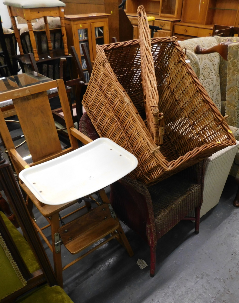 A Lloyd Loom basket, side chair, wicker picnic hamper, mahogany side table, child's high chair.
