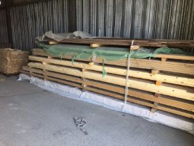 An oak handrail, sixteen white oak stringers, and a pallet of post caps. Note: VAT is payable on th