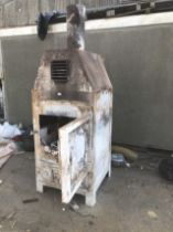 A wood burning stove. Note: VAT is payable on the hammer price of this lot at 20%.