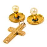 A pair of shirt studs and a small crucifix marked 9ct.