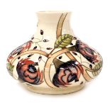 A Moorcroft pottery Pirouette Breeze Wind pottery vase, c2001, decorated against a cream ground, by