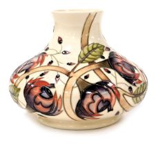 A Moorcroft pottery Pirouette Breeze Wind pottery vase, c2001, decorated against a cream ground, by