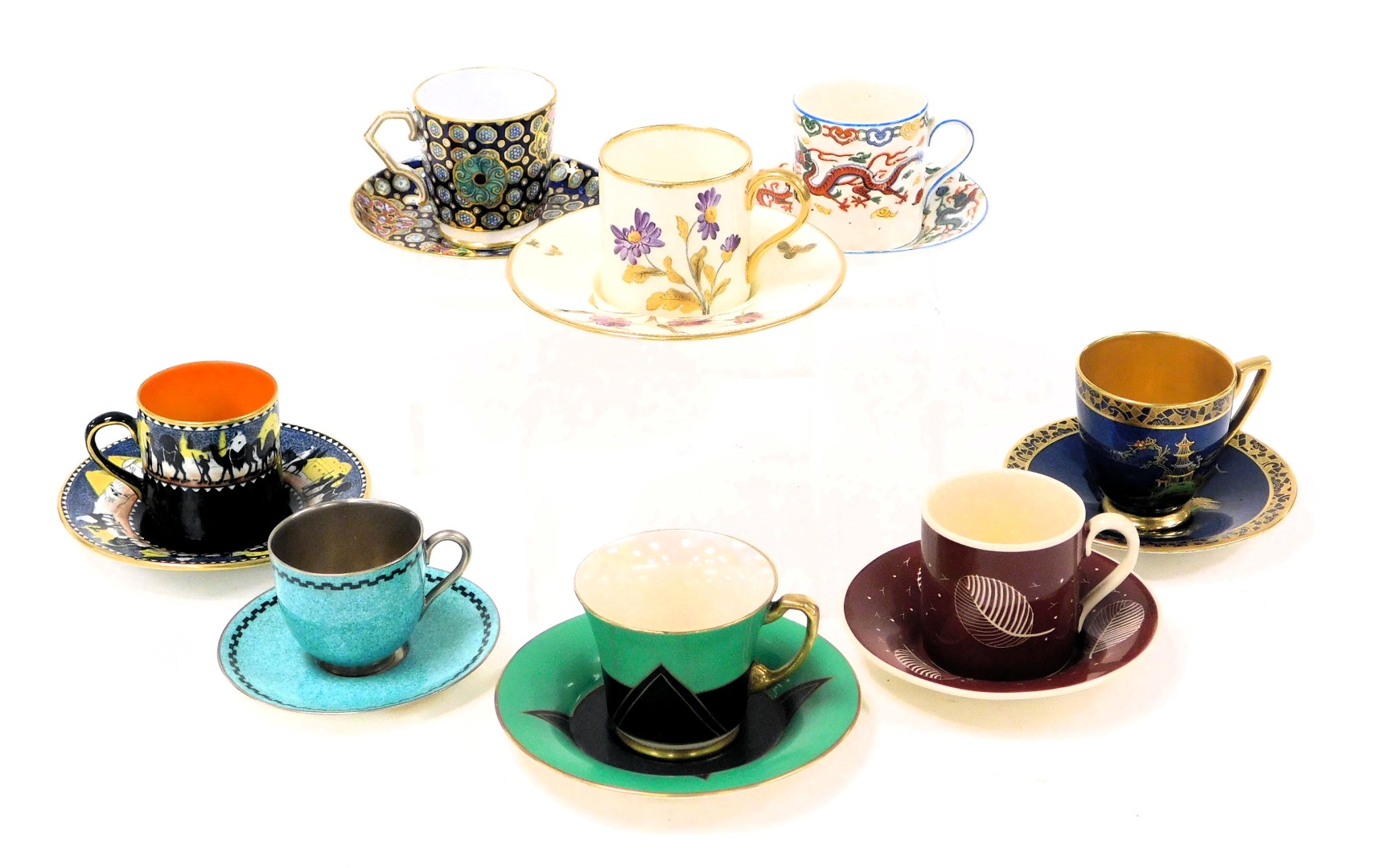 A group of 19thC and later coffee cans and saucers, porcelain and pottery, including Mintons, Crown