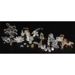 A quantity of Swarovski crystal animals, items include dolphin, mouse, etc.