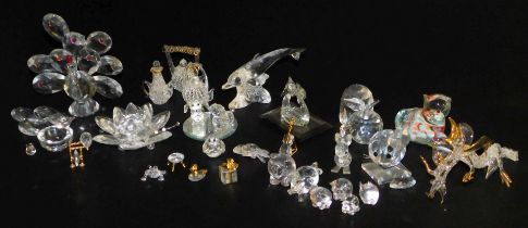 A quantity of Swarovski crystal animals, items include dolphin, mouse, etc.