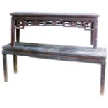 Two Chinese low altar tables, one with pierced decoration, the other with fret work.