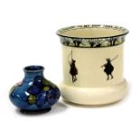 A Moorcroft Clematis pattern pottery vase, of squat baluster form, bears paper label, potters to the