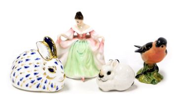 A Royal Crown Derby rabbit, a Soviet Union rabbit, a small Royal Doulton figure of Sarah HN3219, and