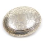A Victorian silver tobacco or snuff box, of oval form, with foliate engraving, circular reserve engr