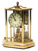 A Kundo brass 400 day anniversary clock, circular dial bearing Arabic numerals, Kilninger and Obergf