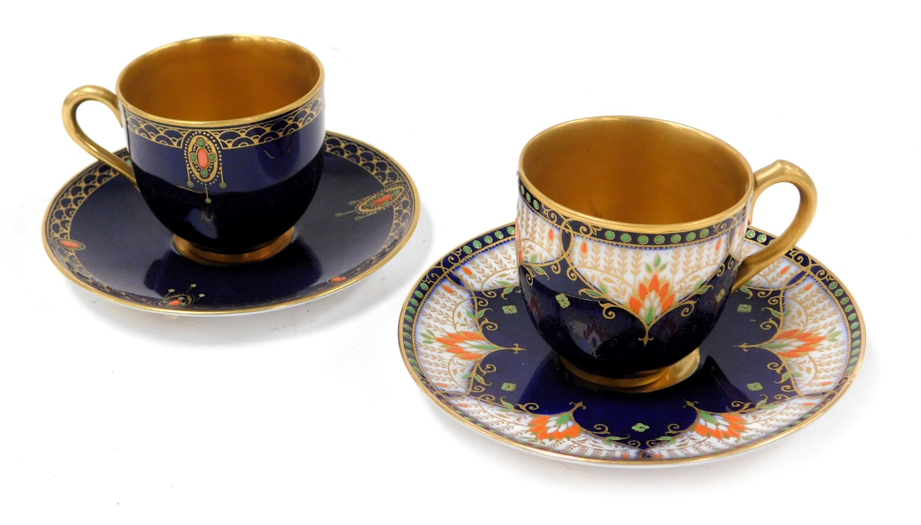 A Royal Worcester porcelain coffee cup and saucer, circa 1926, painted by R Austin, with a peacock a