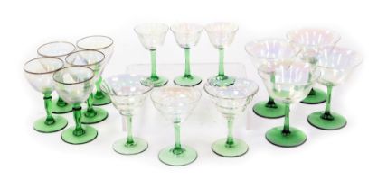 A group of mid century clear lustre glass and green stemmed wine glasses, champagne flutes and lique