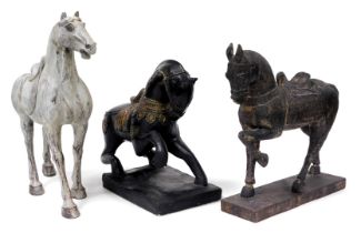 After the Antique. Three wooden carvings of horses, in standing and prancing poses, 43cm, 37cm and 3