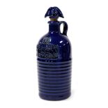 An early 20thC Royal Doulton Seagers Special Dry Gin decanter and stopper, blue glazed, no. 19785, i