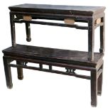 A Chinese stained hardwood bench, with a carved frieze, raised on square legs, 50cm high, 108cm wide