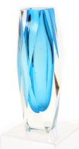 A 1960's Murano pale blue glass vase, possibly Flavio Poli for Seguso, of faceted waisted form, 20cm