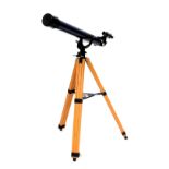 A Japanese Astral 400 telescope, D=60mm, F=700mm, on a wooden tripod extendable stand, telescope 73.