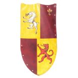 A reproduction shield, with heraldry, 118cm high, 63cm wide, shield shows emblems of goat, a rampant