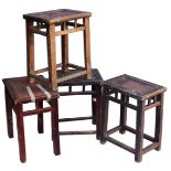Four Chinese hardwood and bamboo stools.
