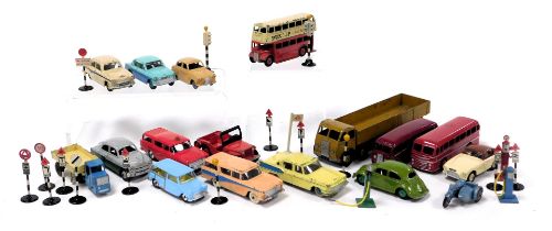 Dinky diecast vehicles, including cars, buses and trucks, traffic lights, road signs, petrol pump, e