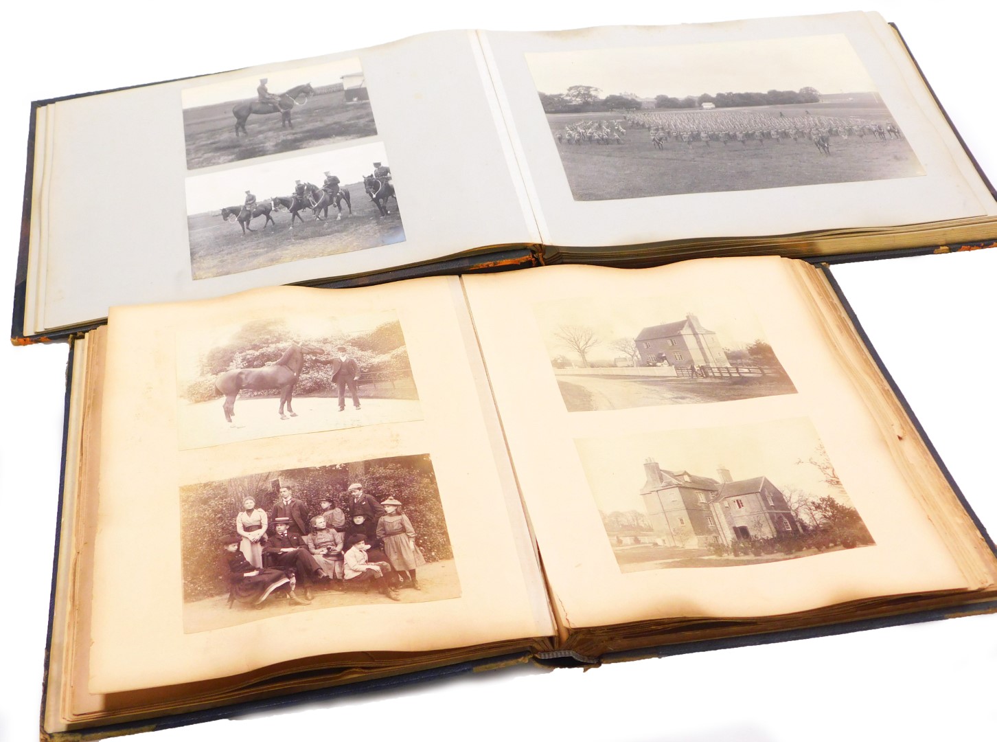 Two Victorian photograph albums, comprising military hunting family and topographical photographs.