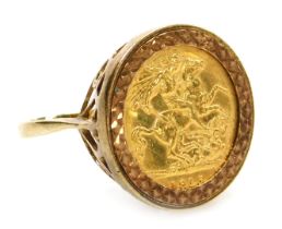 A George V gold half sovereign 1915, in a 9ct gold ring mount, size U, 8.3g.