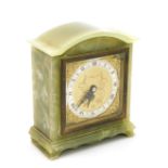 A late 20thC Elliott green onyx cased mantel clock, square brass dial with cherub spandrels, silver