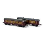 A pair of Hornby O gauge LMS coaches, First Class, red livery, no. 402.