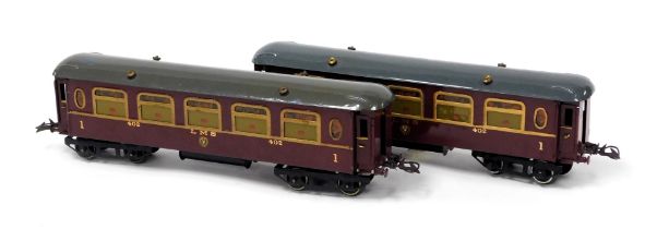 A pair of Hornby O gauge LMS coaches, First Class, red livery, no. 402.