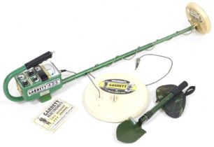 A Garrett Electronics Master Hunter metal detector, with stand and instruction manual, together with