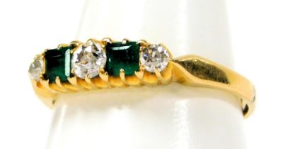 A diamond and emerald five stone set ring, in yellow metal marked 18ct , size L, 2.6g all in.
