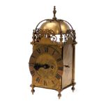 An early 20thC Camerer Cuss and Company brass cased lantern clock, rectangular engraved dial decorat