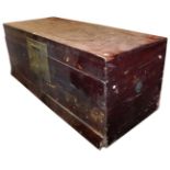 A Chinese hardwood trunk, with a brass lock plate, 61cm high, 157cm wide, 63cm deep.