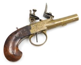 A Continental flint lock box lock brass pistol, c1800, the box engraved with symbols of war, with a
